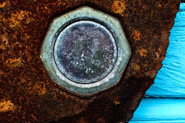 Eroded metal texture with black paint splashes, abstract grunge background