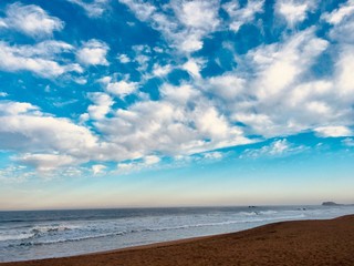 blue clouded sky with beach