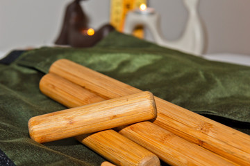 A set of professional bamboo sticks for Thai massage. Preparation for the procedure of healing the soul and body.