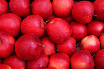 red apples on black background
