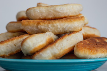 on the table is a dish with delicious homemade cakes stuffed with