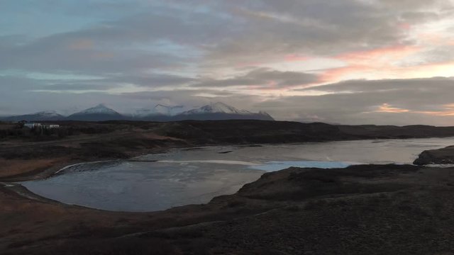 icelandic landscape with sea and mountains during sunset, Iceland