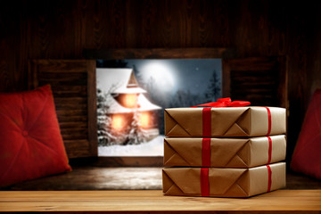 Christmas winter cold night and xmas gifts on window sill