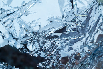 Abstract blue ice surface texture, close-up