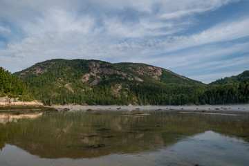 Fototapeta na wymiar reflection of a mountain with a lake