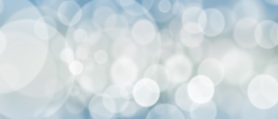 Blue gray abstract background. white bokeh light Christmas blurred beautiful shiny lights use...