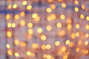 Golden beautiful blurred bokeh background with copy space.