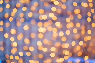 Square background bokeh of sparkling golden festive lights