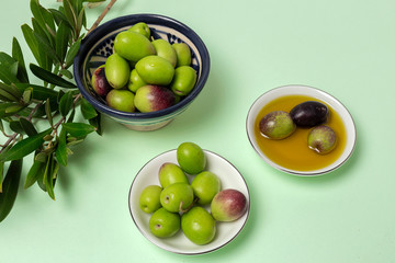 Fresh Spanish extra virgin olive oil with olives