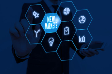Text sign showing New Markets. Business photo showcasing market where the end product or service is new or not exist yet