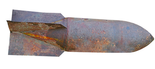 Old rusted World War II aerial bomb on white