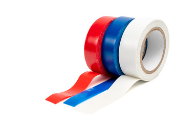 Rolls of insulation adhesive tape, multi colored ribbons on a white background.