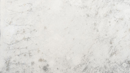 White marble background.	