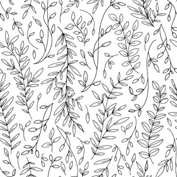 Black leaves and branches seamless pattern. Monochrome decorative template texture with black leaves on the white background.