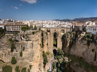 Fototapeta na wymiar Aerial view of Ronda landscape and buildings with Puente Nuevo Bridge, Andalusia, Spain
