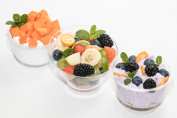 Canapes Cream dessert and fruit on a table in a restaurant
