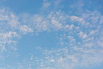 soft blue sky with light clouds