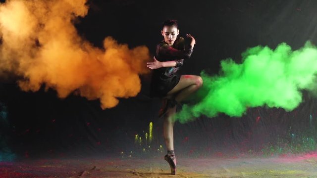 Ballet dance performance with colour powder blast slow motion action clip