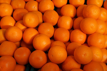 A lot of orange mandarin as a background  © Andrii