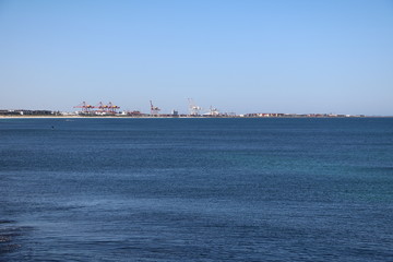 Fototapeta premium View from Cottesloe beach to Port Beach Fremantle in Perth Western Australia