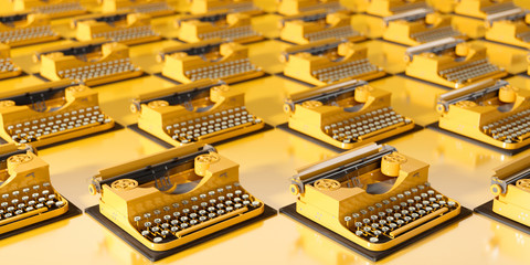 many yellow retro typewriters on a yellow background