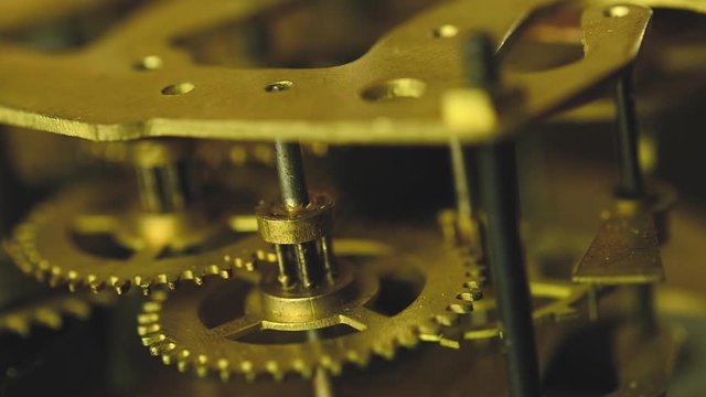 close-up clock mechanism, gears spin