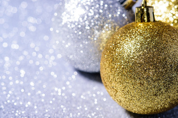  gold and silver christmas balls on a beautiful background