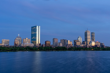 Dusk view of Boston Skyline by Chalres River in summer time