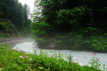 Mist over a mountain river in Bavaria, Germany, Europe