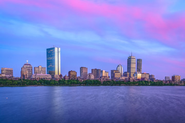 Fototapeta premium Purple sunset view of Boston Skyline by Chalres River in summer