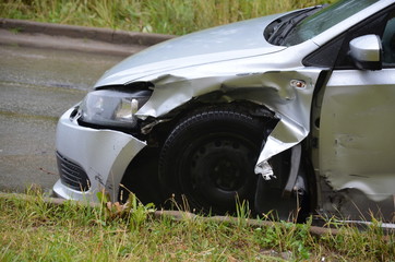 car crash accident on street, damaged automobiles after collision in city