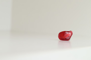  juicy pomegranate on a white background. beautiful contrast. natural color