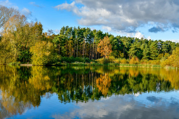 Fototapeta premium walk on the autumn colors by the lake