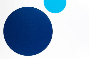 Light blue and navy round circle shape color paper geometry composition background
