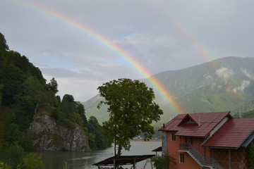 Rainbow over mountain