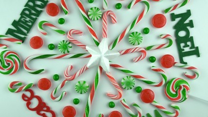 Christmas Eve holiday mood close up background. Winter Merry days  traditional ornament of candy...