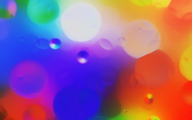 Obraz na płótnie Canvas Abstract blurred colorful liquid light show background