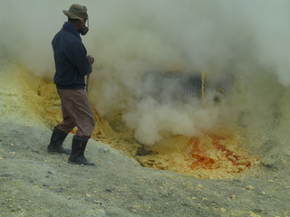 man and fire from a volcano