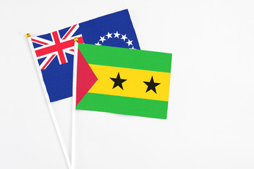Sao Tome And Principe and Cook Islands stick flags on white background. High quality fabric,...