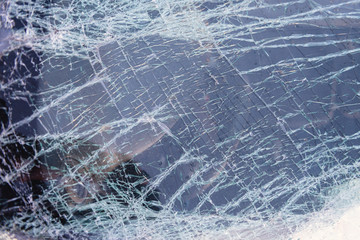 Broken glass car. Windshield after an accident. Broken after the accident windshield.