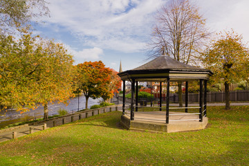 River Dee and the rural Welsh market town of Llangollen with the Victoria promenade bandstand and park in Llangollen North Wales