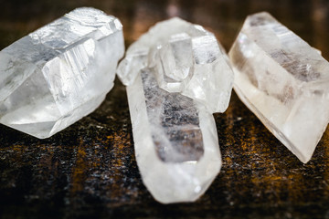 Transparent quartz or rock crystal is the second most abundant mineral on earth. It has a trigonal crystalline structure composed of silica tetrahedra. Crushed Ore. Esoteric pattern and zen