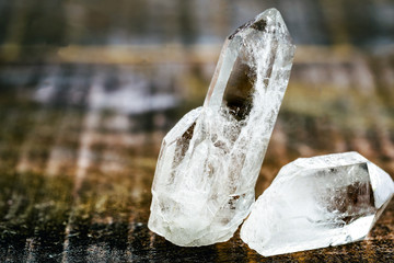 Macro mineral stone rhinestone, rock crystal on a black background close up, Transparent quartz.