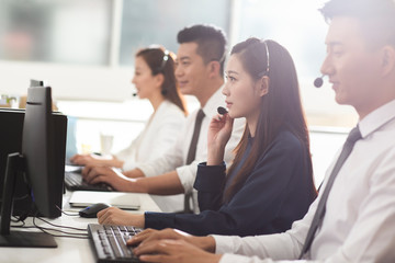 Chinese business people working in office