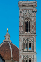 Fototapeta na wymiar The tower of Cathedral of Santa Maria del Fiore in Florence, Tuscany, Italy