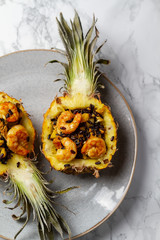 Mini pineapple fried black rice with shrimps