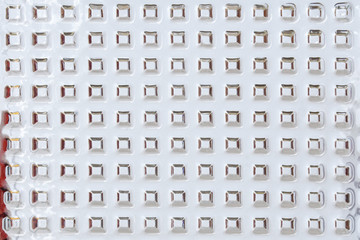 Textured glass with a repeating embossed pattern. Building, decorating or insulating glass...