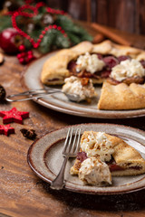 Quince tart. Galette with red wine quince, cream and ice-cream.