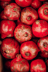  tasty ripe red pomegranate on the food market