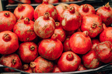 tasty ripe red pomegranate on the food market